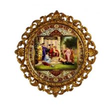 A VIENNA PORCELAIN LARGE PLAQUE, late 19th century, of circular form, centrally painted in
