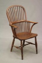 AN ASH AND ELM STICK BACK WINDSOR ARMCHAIR, Thames Valley, 19th century, with high hoop back,