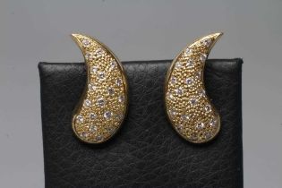 A PAIR OF DIAMOND CLIP EARRINGS, the pointelle coma shaped panels pave set with scattered small