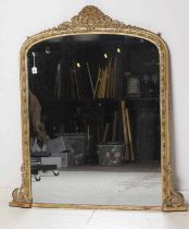 A VICTORIAN GILT GESSO OVERMANTEL MIRROR, the arched plate within a moulded frame with cabochons