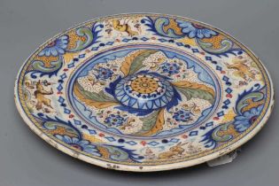 A SPANISH MAIOLICA CHARGER, probably 19th century Talavera, of circular form with central raised