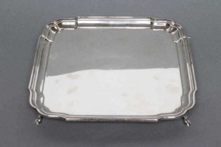 A SILVER SALVER, maker Barker Bros., Chester 1924, of square form with re-entrant corners, raised