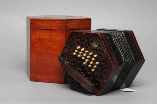 A LACHENAL & CO., LONDON CONCERTINA, with rosewood ends and thirty nine bone buttons, maker’s
