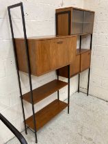 AN AVALON TEAK SECTIONAL MODULAR WALL UNIT in two sections and comprising a bureau with fallfront, a