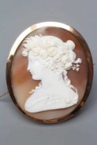 A VICTORIAN SHELL CAMEO of oval form, carved with the head and shoulders portrait of a young lady