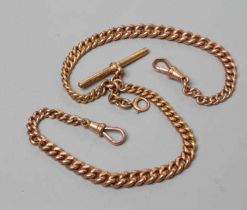 A 9CT GOLD GRADUATED CURB LINK DOUBLE ALBERT CHAIN, with bar and two dog clip fasteners, stamped 9,
