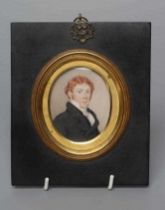 ENGLISH SCHOOL (Early 19th Century) A Gentleman in a black frock coat, oval miniature on ivory,