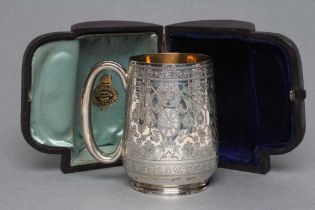 A LATE VICTORIAN SILVER CHRISTENING MUG, maker Nathan & Hayes, London 1888, of tapering rounded