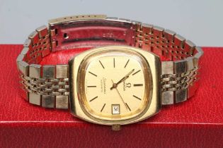 A GENTLEMAN'S OMEGA SEAMASTER AUTOMATIC WRISTWATCH, the rounded square gilt dial with centre seconds