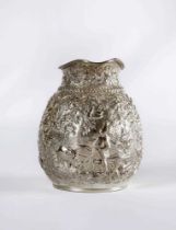 AN AMERICAN SILVER JUG, maker S. Kirk & Son, 1861-1868, of bombe cylindrical form, chased and