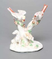 A BOW PORCELAIN GROUP, c.1760, modelled as two birds perched upon flower encrusted branches with a