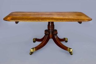 A REGENCY MAHOGANY BREAKFAST TABLE, early 19th century, the banded reeded edged tilt top on ring