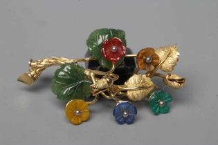 A TUTTI-FRUTTI SPRAY BROOCH, stamped 585, with carved and polished semi precious flowerheads and