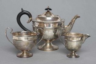 A THREE PIECE SILVER TEA SERVICE, maker Viners, Sheffield 1933 (teapot) and 1934, of single