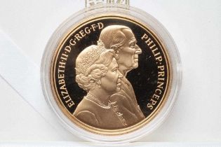 AN ELIZABETH II PROOF CROWN, 1997, Queen and Prince Philip's Golden Wedding, 39.9g, in capsule and