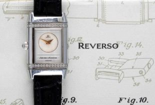 A LADY'S JAEGER-LECOULTRE DIAMOND REVERSO WRISTWATCH, one side with small mother of pearl circular