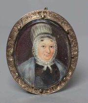 ENGLISH SCHOOL (19th century) Portrait of a Woman in a lace bonnet, oval miniature on ivory with