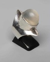 A MODERNIST SILVER RING by Rod Edwards, London 1968, the large eliptical panel with a high set
