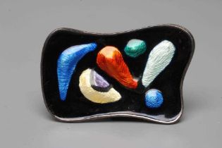 A NORWEGIAN STERLING SILVER AND ENAMEL BROOCH designed by Oystry Balle, of shaped oblong form with
