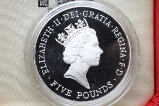 AN ELIZABETH II SILVER PROOF CROWN, 1996, 70th Birthday issue, 28.2g, in capsule and cased with