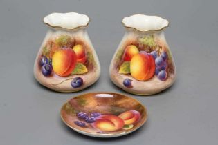 A PAIR OF ROYAL WORCESTER CHINA VASES, 1954, of tapering rounded cylindrical form with lobed rim,