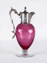 A SILVER MOUNTED CRANBERRY GLASS CLARET JUG, maker's mark WW, London 2001, the lightly ribbed