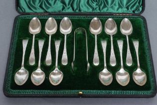 A SET OF TWELVE LATE VICTORIAN SILVER TEASPOONS, maker Cooper Bros., Sheffield 1899, with bright cut