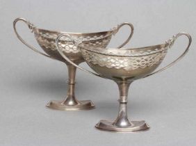 A PAIR OF SILVER PEDESTAL SWEETMEAT DISHES, maker Syner & Beddoes, Chester 1912, the oval bowls with