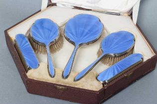 AN ART DECO SILVER SIX PIECE DRESSING TABLE SET, maker possibly A. Clark, Birmingham 1931, with
