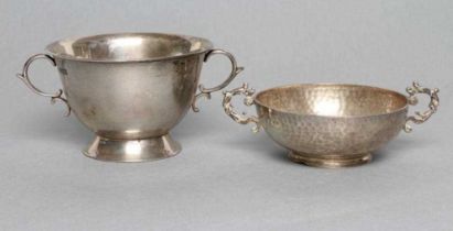 AN EDWARDIAN SILVER PORRINGER, maker A. J. Ramsey, Sheffield 1910, with double C scroll handles on a