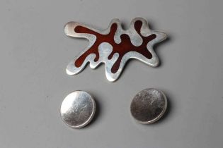 A GEORG JENSEN SILVER AND BROWN ENAMEL AMOEBA BROOCH designed by Henning Kopper and numbered 371,