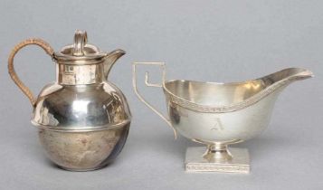 A SILVER SAUCEBOAT, maker Walker & Hall, Sheffield 1924, the plain oval bowl with Greek key cast and