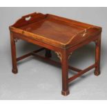 A MAHOGANY BUTLERS TRAY COFFEE TABLE, late 18th century and later, the oblong galleried top with