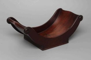 A REGENCY MAHOGANY CHEESE COASTER, early 19th century, with split baluster handles and applied