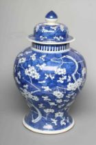 A CHINESE PORCELAIN LARGE JAR AND COVER of inverted baluster form, painted in underglaze blue with