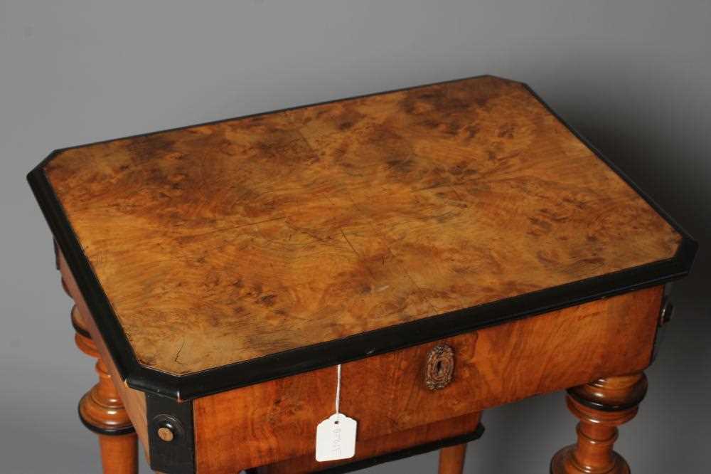 A VICTORIAN WALNUT AND MAPLE SEWING TABLE of canted oblong form with ebony trim, the hinged lid - Image 2 of 4