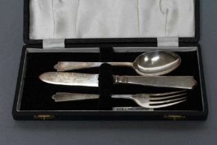 A THREE PIECE SILVER CHRISTENING SET, maker Wakely & Wheeler, London 1949/52/53, comprising dog nose