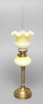 A SMALL VICTORIAN BRASS OIL LAMP, the yellow and white satin glass ball shaped shade and reservoir