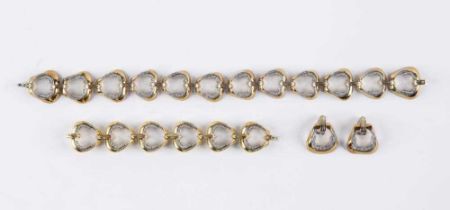 A DIAMOND SUITE comprising necklace, bracelet and pair of clip earrings, the large shaped