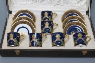 A CARLTON WARE COFFEE SERVICE, 1930's, printed and painted in typical colours with a chinoiserie