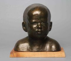 Y ROBERT K FRAMPTON (Contemporary) "One Year Old", bronzed composition bust on oblong wood base,