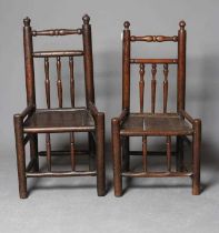 AN ASH AND OAK BACKSTOOL, c.1700 (?), the plain uprights with incised banding and turned finials,