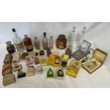 A collection of vintage perfume bottles to include Alexis Guerin Parfum Imerial Russe, Saville