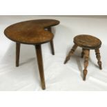 A small 19thC milking type stool 25cm h along with a mid 20thC small coffee table 51 x 24 x 32cm.