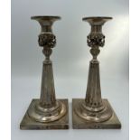A pair of German silver candlesticks c.1860 22.5cm h. Total weight approximately 583gm.