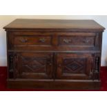 An 18th/19thC oak chest, two drawers over 2 cupboards, replacement handles and hinges. 80 h x 122