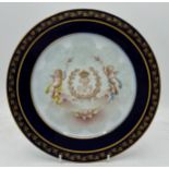A Sevres 19thC porcelain Chateau des Tuileries cabinet plate with King Louis Philippe monogram and