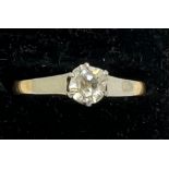 Solitaire diamond ring set in yellow metal, marks rubbed. Total weight 2.2gm. Size N.
