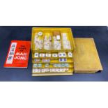 A vintage cased Mahjong set with bamboo and boned tiles, handbook etc.