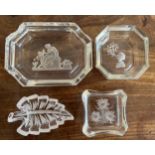 Glass trinket dishes and ashtrays to include Heinrich Hoffman smoking lady 9.5 x 9.5cm.